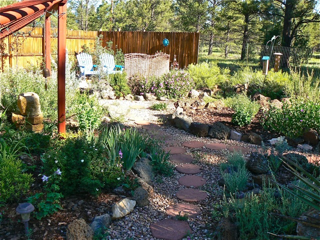 Garden and chairs and trail Cimarron Rose For Sale